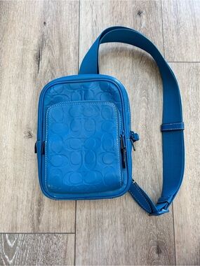 COACH Blue Unisex Crossbody Bag - Signature Embossed Design in leather